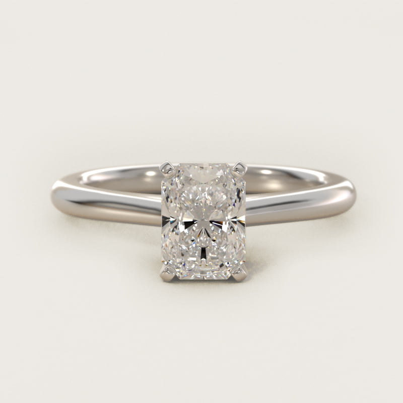 Petite Solitaire Engagement Ring in Platinum