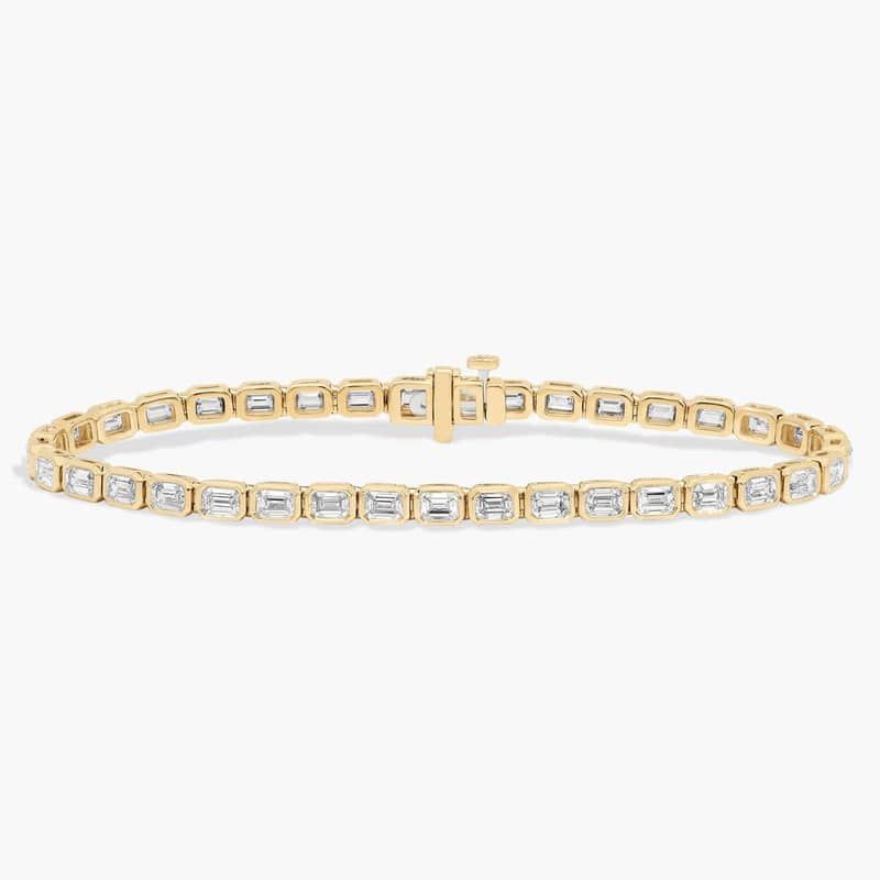 7 " Emerald Cut Lab Grown Diamond  E/W Bezel Set Tennis Bracelet In 14K Yellow Gold (5 Ct. tw. - F-G / VS2-SI1)