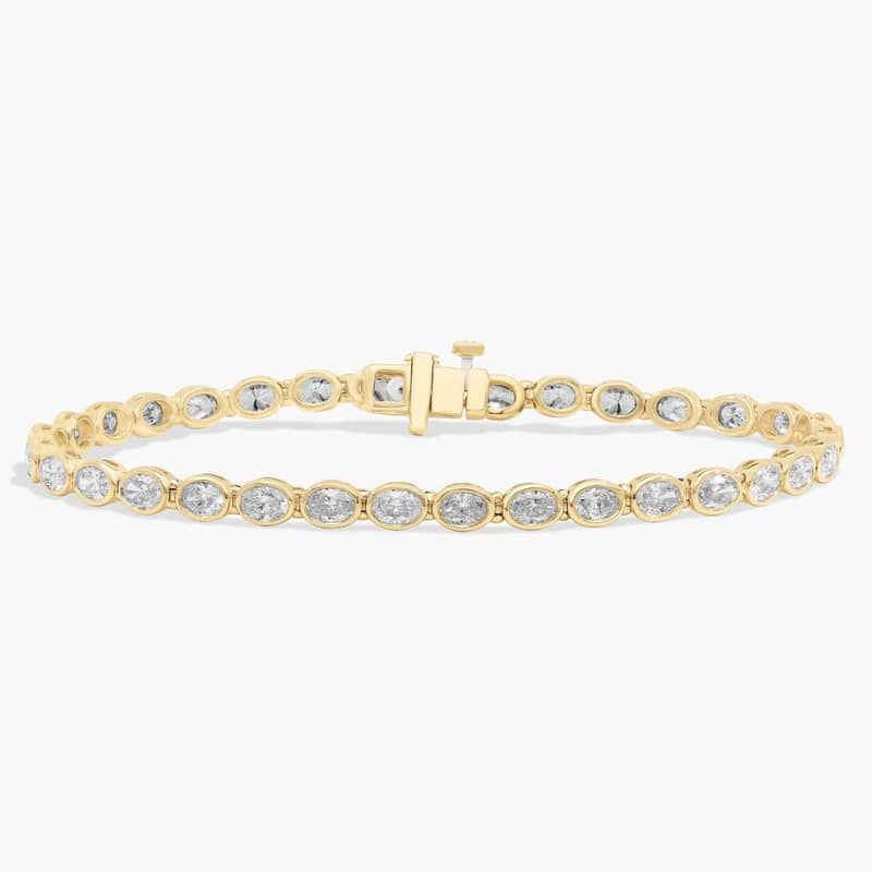 7 " Oval Cut Lab Grown Diamond  E/W  Bezel Set Tennis Bracelet In 14K Yellow Gold (5 Ct. tw. - F-G / VS2-SI1)