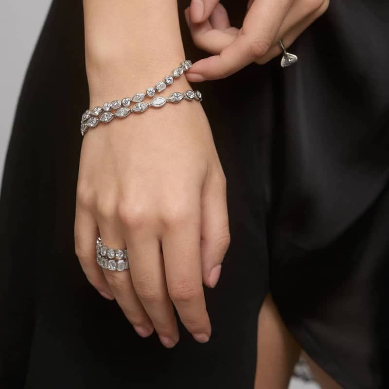 East-West Bezel Tennis Bracelet With 10 CTW Marquise Cut Diamonds in Platinum