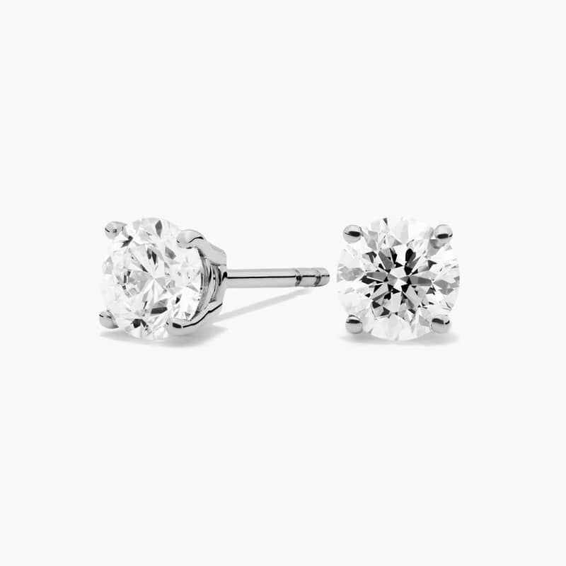 Four Prong Round Brilliant Diamond Stud Earrings In 14K White Gold (1 Ct. tw. - H-I / SI1-SI2)