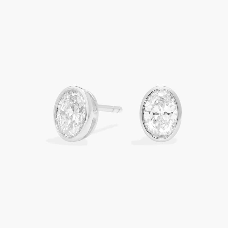 Bezel Diamond Stud Earrings With 1 CTW Oval Cut Diamonds in 14K White Gold