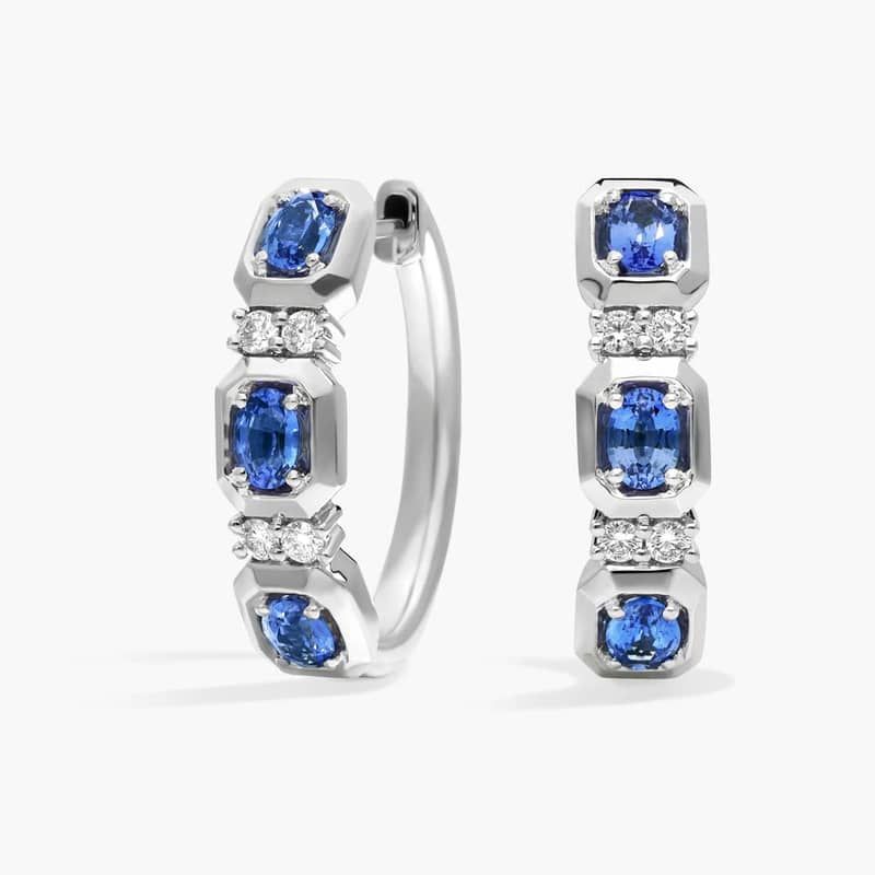 Oval Cut Blue Sapphire and Diamond Hoop Earrings In 14K White Gold